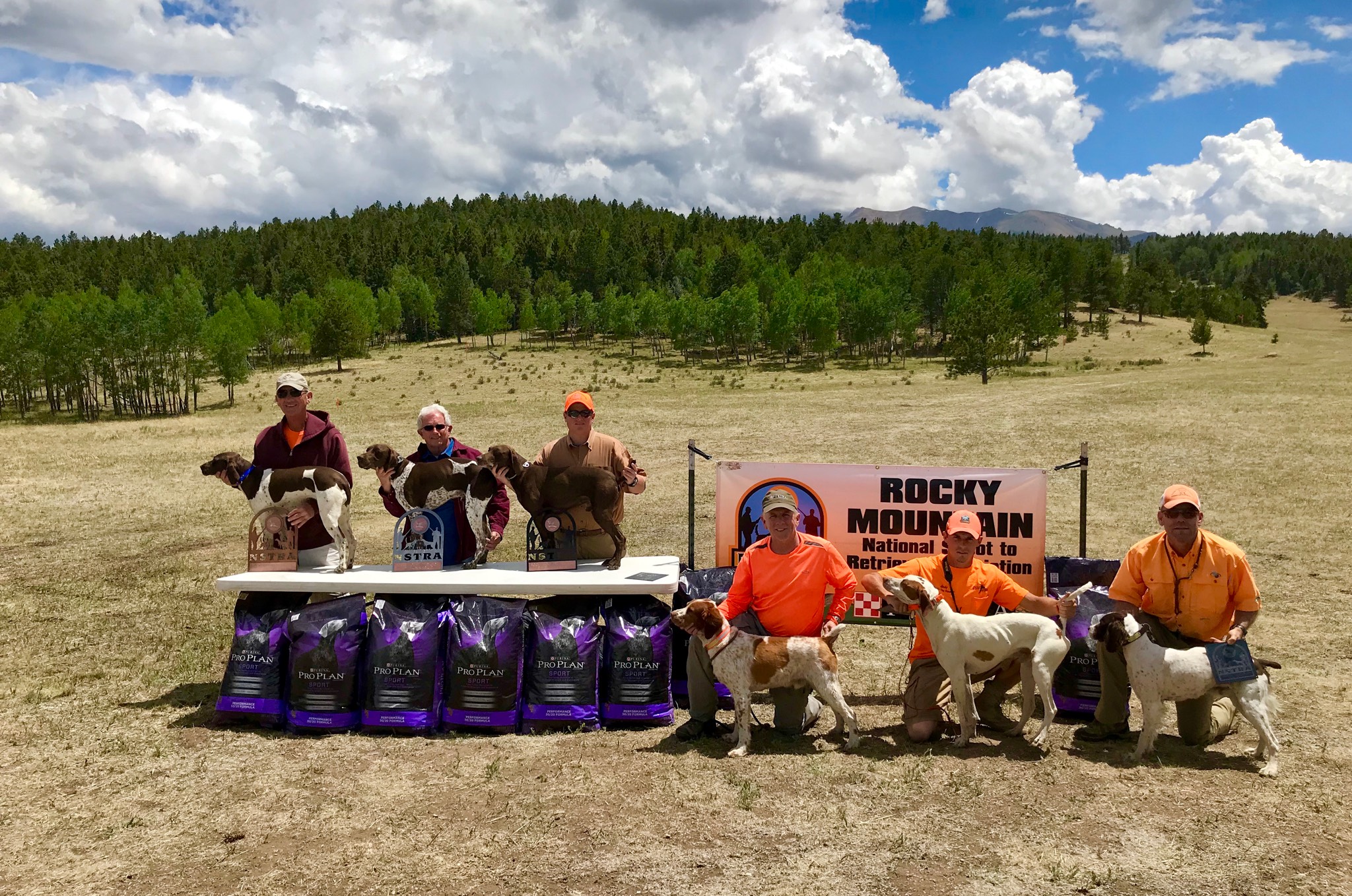 Pictured from left to right: Mark Pace, with Black Forest Libby, Don Cooperrider with Black Forest Sam, Chris Cooperrider with Black Forest Aspen's Last Chance.